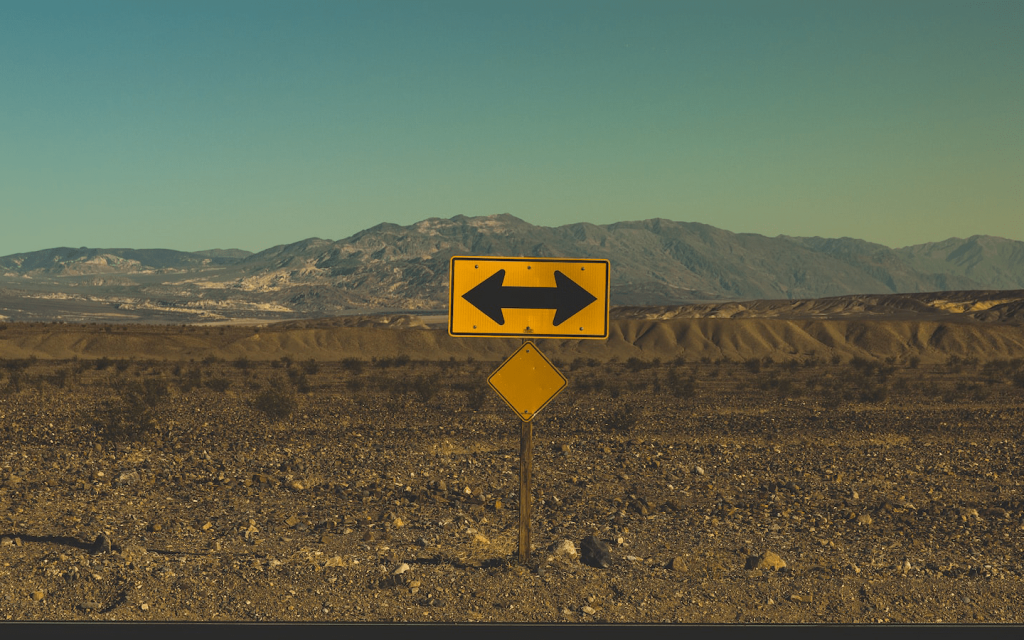 This is a road side sign which inform a driver that they can either go left or right, signifying the crossroads face by all the characters in episode 5 season 3 of "Grown-ish".