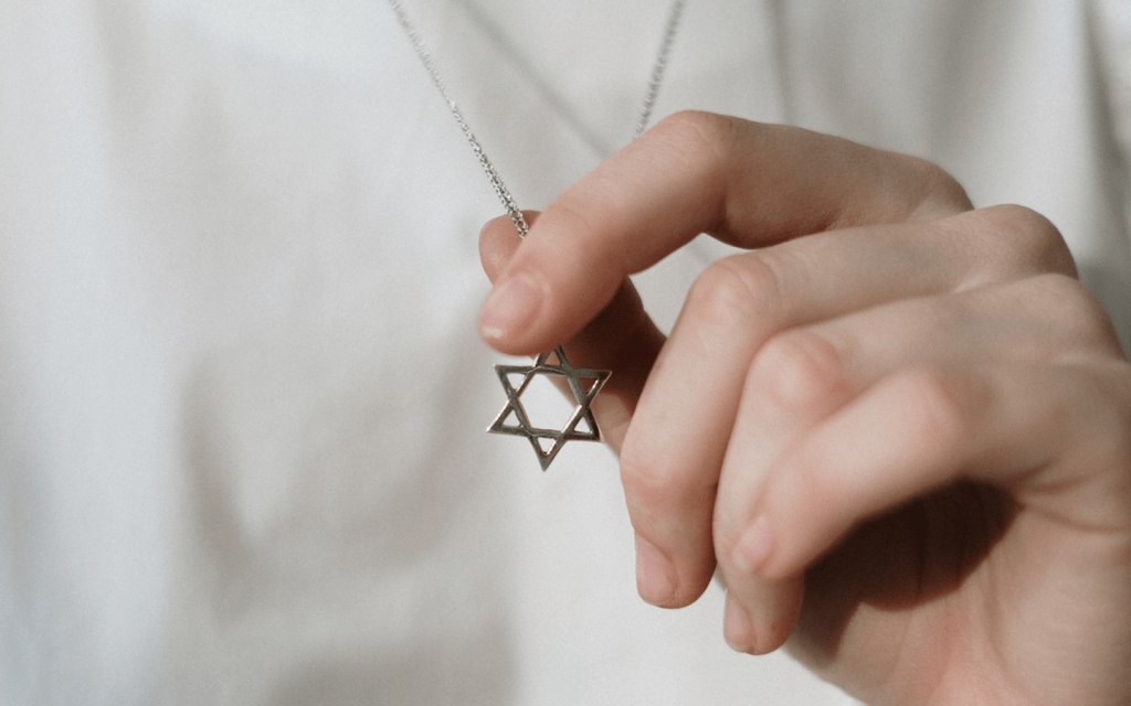 person-holding-a-star-of-david