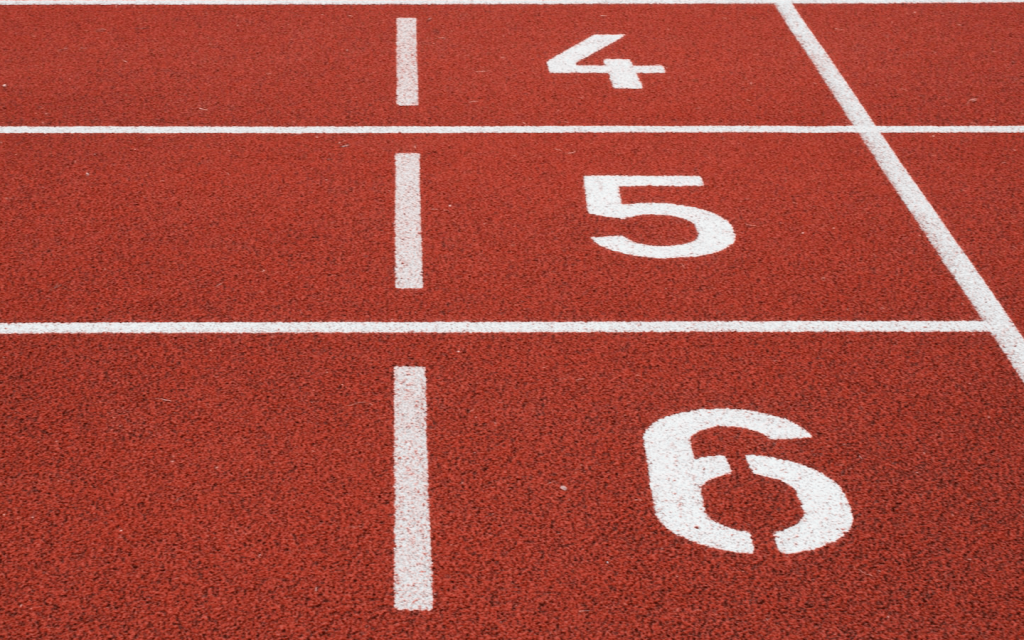 This is a track field with the numbers 4, 5, and 6 inscribed to represent the track field in "Run On".